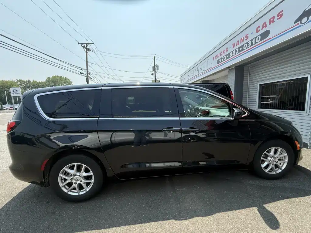 Black 15-person passenger van